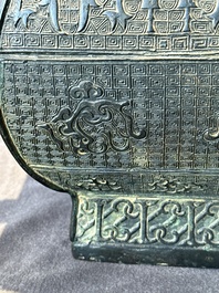 A Chinese archaistic bronze ritual wine vessel and cover in Western Zhou-style, 'fang hu 方壺', Ming