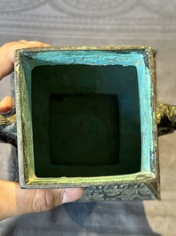 A Chinese archaistic bronze ritual wine vessel and cover in Western Zhou-style, 'fang hu 方壺', Ming