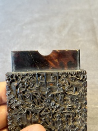 A Chinese jade carving, a tortoiseshell card holder and an iron-red snuff bottle, 19th C.