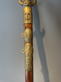 A silver plated dagger and four swords, China, Burma and Indonesia, 18/19th C.