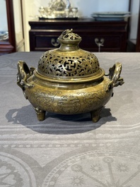 A Chinese imperial archaistic gold-splashed bronze censer and cover with chilong and 'shou' design, Xuande mark, 17th C.