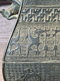 A Chinese archaistic bronze ritual wine vessel and cover in Western Zhou-style, 'fang hu 方壺', Ming