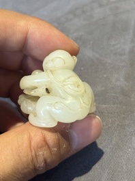 Three Chinese jades and an agate belt hook, Shang and later