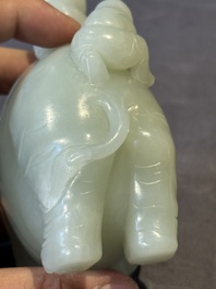 A Chinese celadon jade group of two boys cleansing an elephant, 18th C.