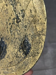 A pair of Chinese imperial gilt-bronze stirrups with dragons, De 德 mark, 18th C.