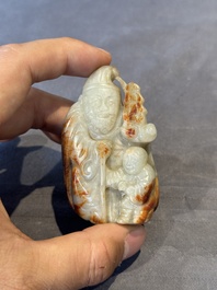 A Chinese jade carving, a tortoiseshell card holder and an iron-red snuff bottle, 19th C.