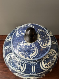 A Chinese blue and white jar and cover with floral design, Wanli