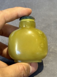 A Chinese yellow jade snuff bottle with moss agate cover and bone stopper, 19th C.