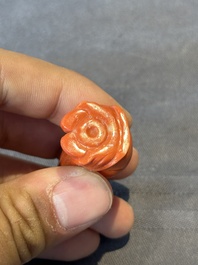 A Chinese carved red coral 'boy and vase' snuff bottle and stopper, 19th C.