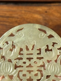 A Chinese jade 'dragon' plaque, a 'double-happiness' plaque and a jade inset silver brooch, 19th C.