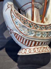 Two Chinese famille rose vases, two teapots and a Japanese wucai ewer, 19th C.