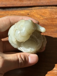 A Chinese white and russet jade 'Lu Ru Feng Qin 鹿乳奉親' carving, Qing