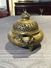 A Chinese imperial archaistic gold-splashed bronze censer and cover with chilong and 'shou' design, Xuande mark, 17th C.
