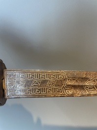A silver plated dagger and four swords, China, Burma and Indonesia, 18/19th C.