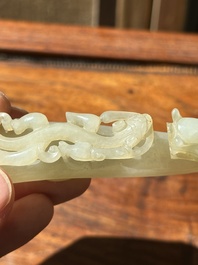 Two fine Chinese white jade carved belt hooks, Qing