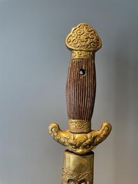 A silver plated dagger and four swords, China, Burma and Indonesia, 18/19th C.