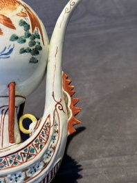 Two Chinese famille rose vases, two teapots and a Japanese wucai ewer, 19th C.