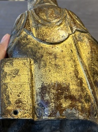 A rare Chinese parcel-gilt and lacquered pewter Guanyin, 17/18th C.