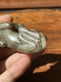 A Chinese partly black coloured white jade dog carving, Qing