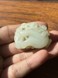 A Chinese white jade sculpture of a boy and a double gourd, Qing