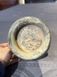 A Chinese archaic bronze ritual wine vessel with buffalo heads, 'zhi 觯', Western Zhou