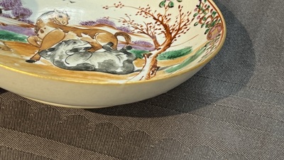 Four Chinese famille rose cups and saucers and an ewer with design of two horses, Qianlong