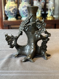 A Chinese bronze vase in the shape of a prunus, Ming