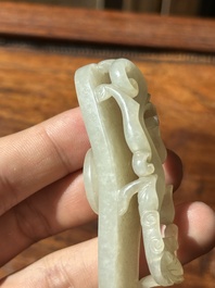 Two fine Chinese white jade carved belt hooks, Qing