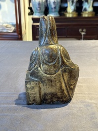 A rare Chinese parcel-gilt and lacquered pewter Guanyin, 17/18th C.
