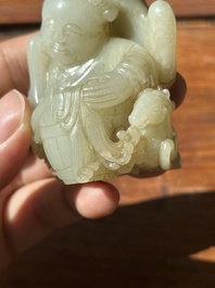 A Chinese white and russet jade 'Lu Ru Feng Qin 鹿乳奉親' carving, Qing