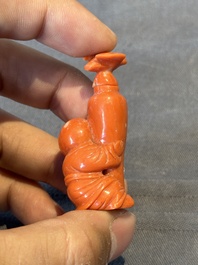 A Chinese carved red coral 'boy and vase' snuff bottle and stopper, 19th C.