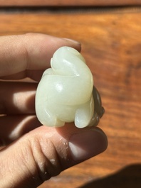 A Chinese white jade carving of a reclining camel, Qing
