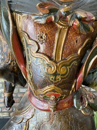 A large Japanese polychromed and gilt-lacquered wood figure of a divine general, Edo, dated 1623