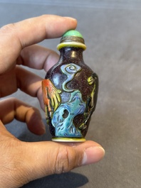 A Chinese overlay Peking glass snuff bottle with horses, Yongzheng mark, 19th C.
