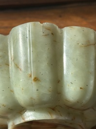 A Chinese celadon and russet jade wedding cup, 18th C.