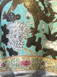 A Chinese famille rose turquoise-ground 'dragon' flower vase, 19th C.