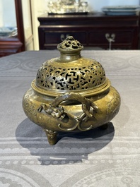 A Chinese imperial archaistic gold-splashed bronze censer and cover with chilong and 'shou' design, Xuande mark, 17th C.
