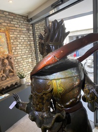 A large Japanese polychromed and gilt-lacquered wood figure of a divine general, Edo, dated 1623