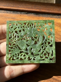 A Chinese jade 'dragon' plaque, a 'double-happiness' plaque and a jade inset silver brooch, 19th C.