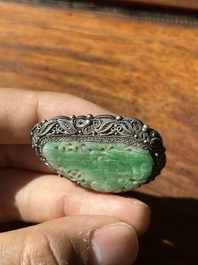 A Chinese jade 'dragon' plaque, a 'double-happiness' plaque and a jade inset silver brooch, 19th C.