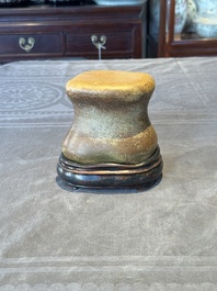 A Chinese scholar's rock on wooden stand, Ming or later