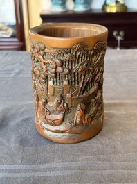 A Chinese carved bamboo 'Seven Sages of the Bamboo Grove' brush pot, 19th C.