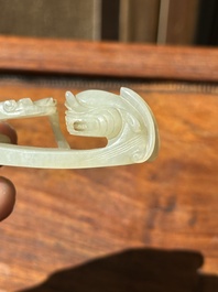 Two fine Chinese white jade carved belt hooks, Qing