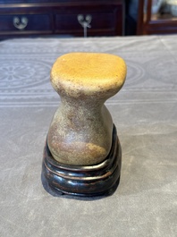 A Chinese scholar's rock on wooden stand, Ming or later