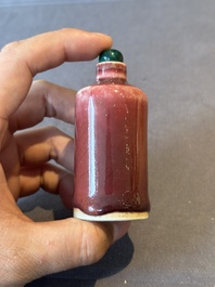 Two Chinese copper-red-glazed snuff bottles, Kangxi mark, 19th C.