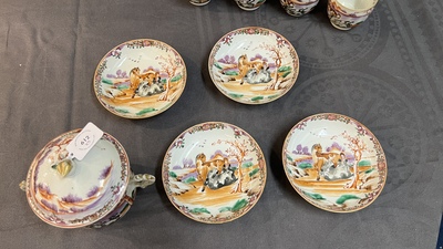 Four Chinese famille rose cups and saucers and a sugar bowl with design of two horses, Qianlong