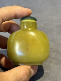 A Chinese yellow jade snuff bottle with moss agate cover and bone stopper, 19th C.