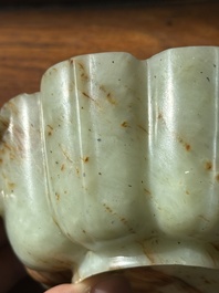 A Chinese celadon and russet jade wedding cup, 18th C.
