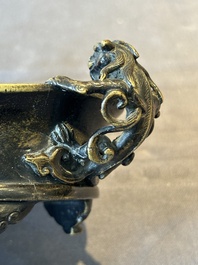 A rare Chinese bronze narcissus basin-shaped censer with dragon handles, Xuande mark, 17th C.