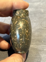 Five Chinese jade and hardstone snuff bottles, 20th C.